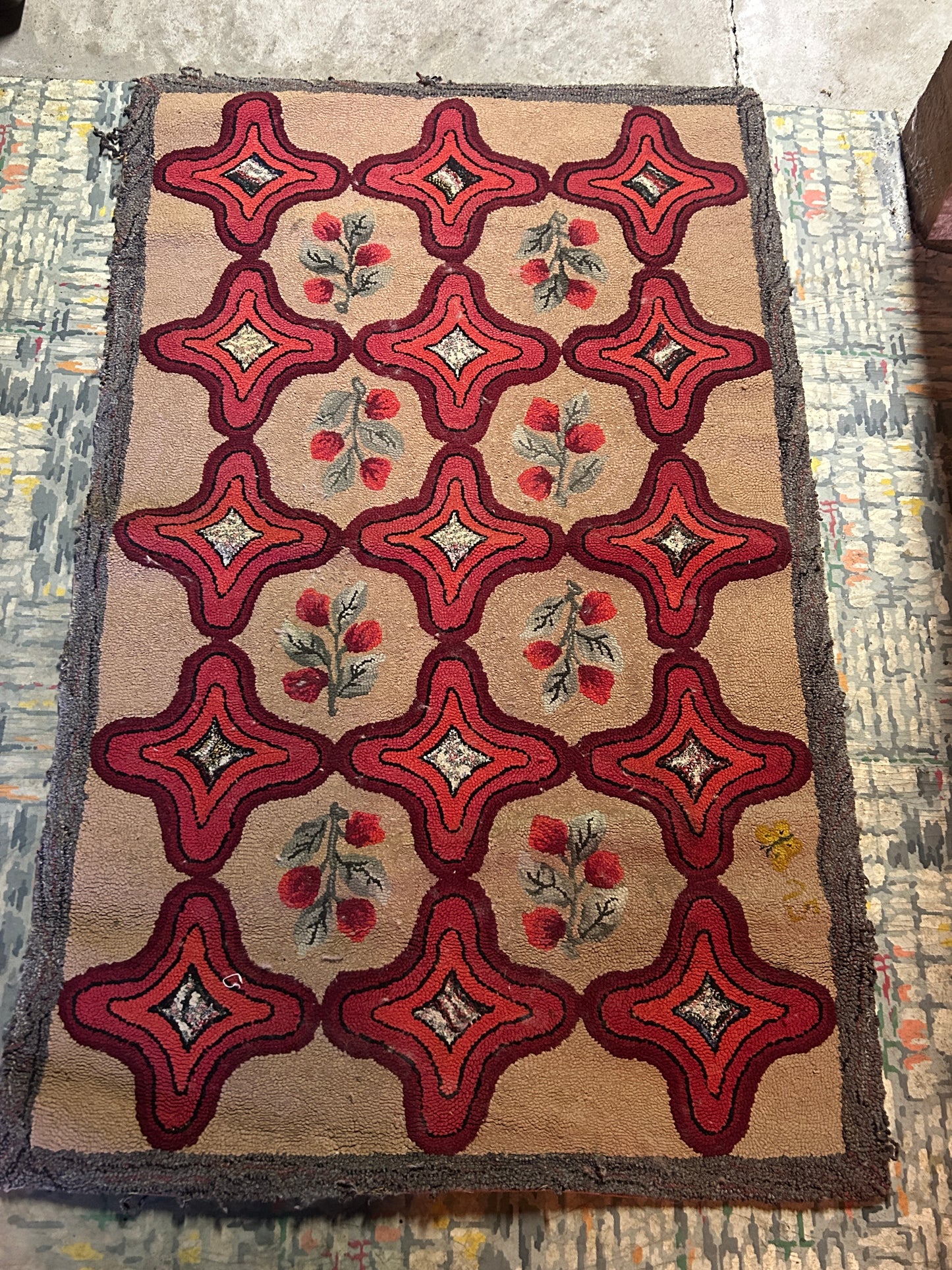 Antique hand hooked rug 29.25” x 47”, red